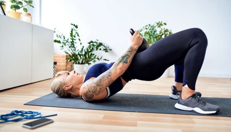 woman performing a HIIT exercise