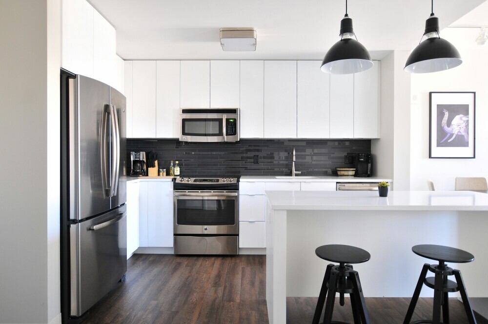 This captivating image showcases a pristine, modern kitchen designed to inspire creative ideas for your culinary space. The sleek combination of functionality and style makes this kitchen a standout example for anyone looking to revamp their home.