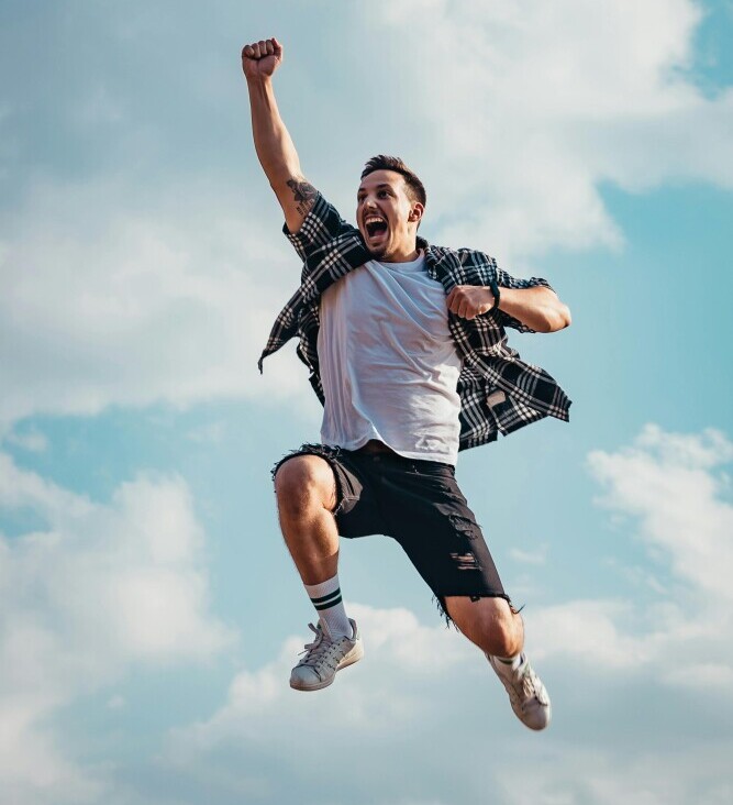 man jumping for joy