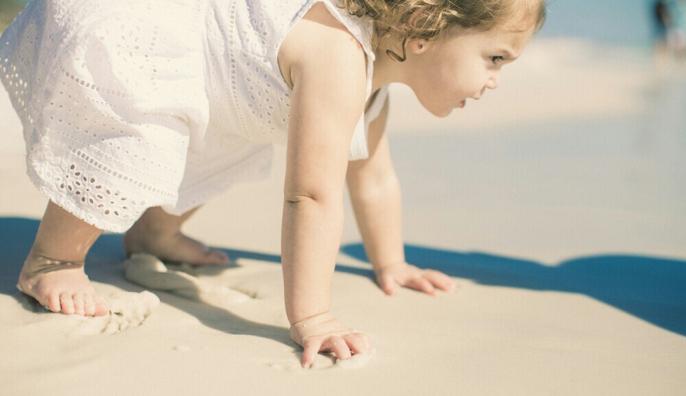 small child trying to walk
