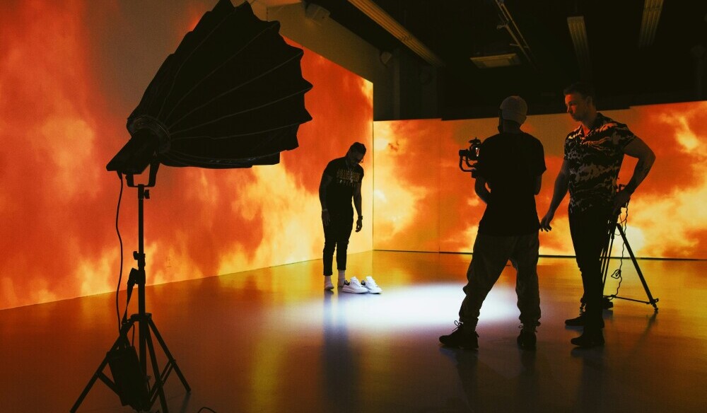 on a film set with fire background