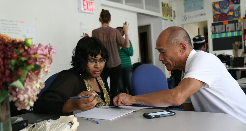 mentor helping adult student