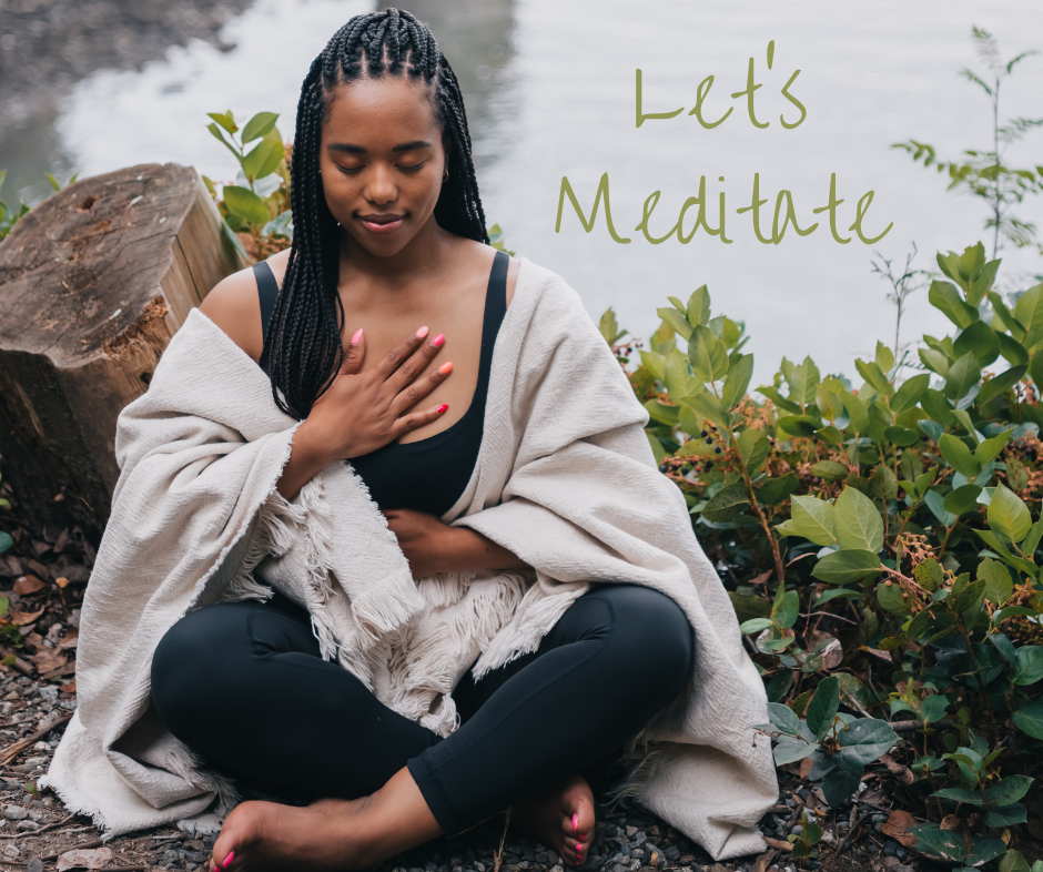 Young black woman sitting on the floor with hand on heart meditate to show the benefits and answer the question: how does meditation work?