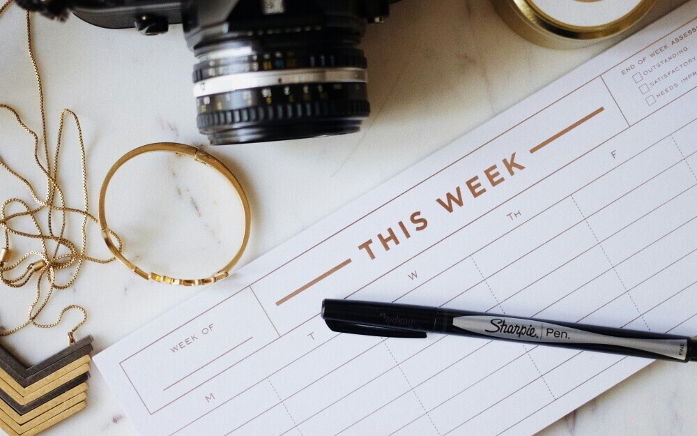 desk calendar and pen