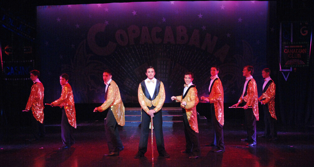 Musical theatre performers dancing