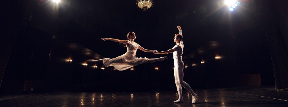 a couple dancing ballet