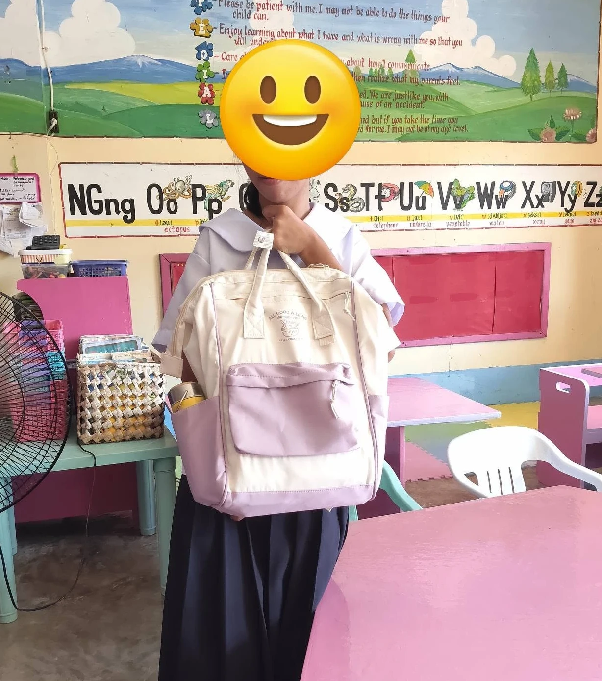 Adopt a learner project Special needs girl receiving her school bag with school supplies- Adopt a learner project