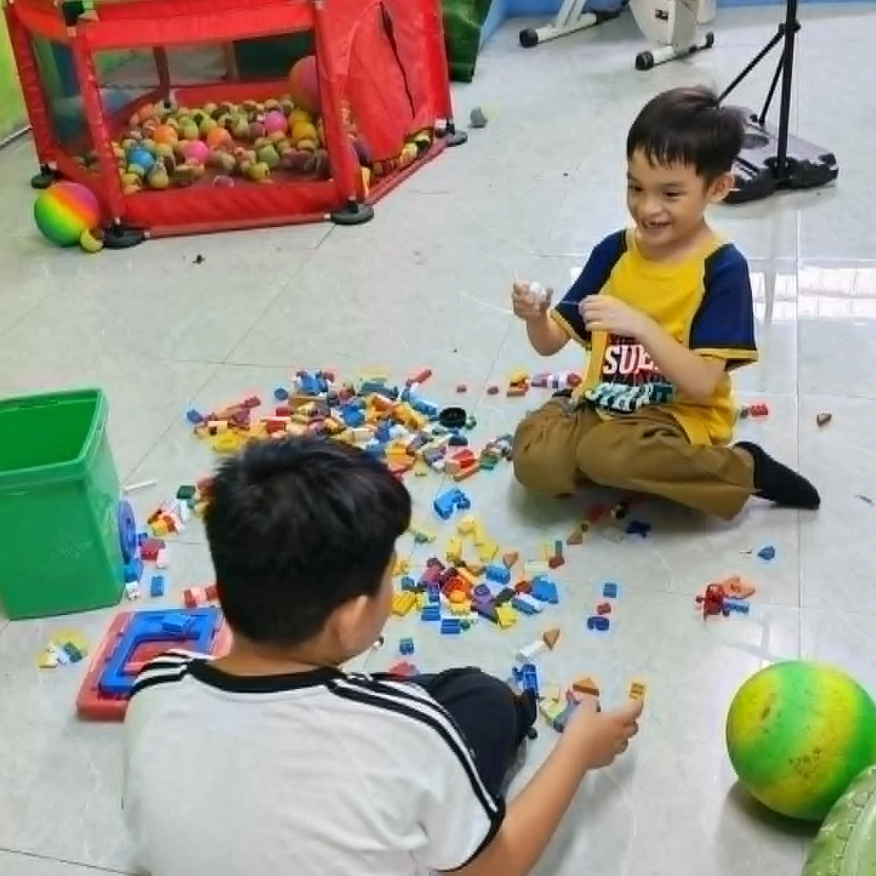 Special needs classmates enjoying at the indoor play therapy area Special needs classmates enjoying at the indoor play therapy area