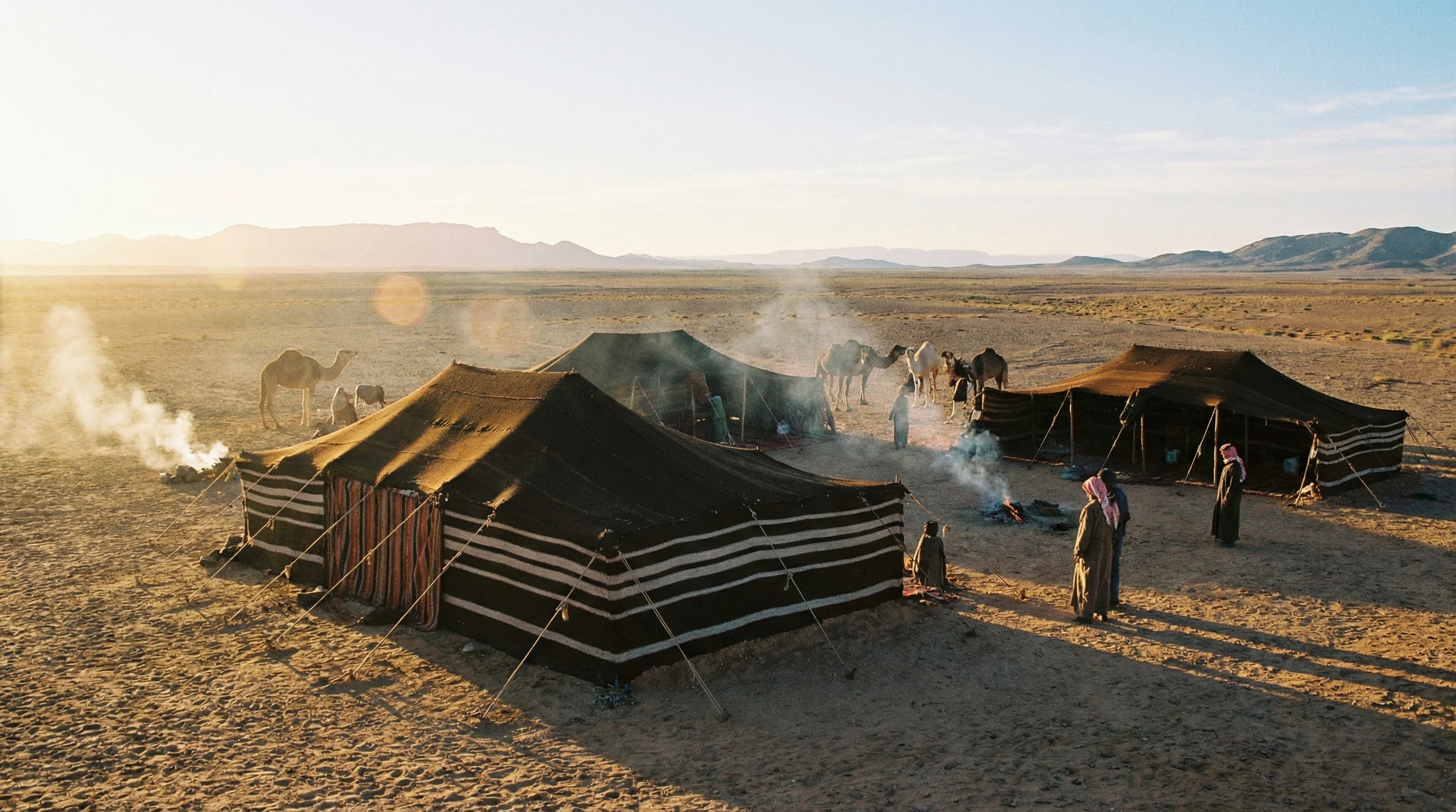 Tent settlement on an open plain, evoking ancient community life