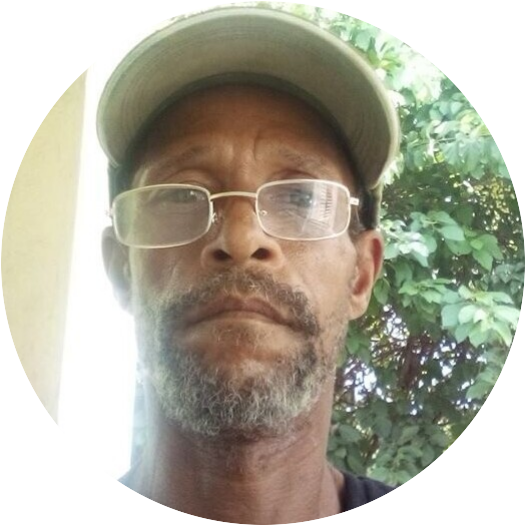 Dean Taylor wearing a hat and glasses