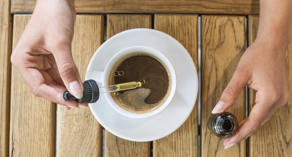 Adding CBDFX Calming Tincture to Coffee
