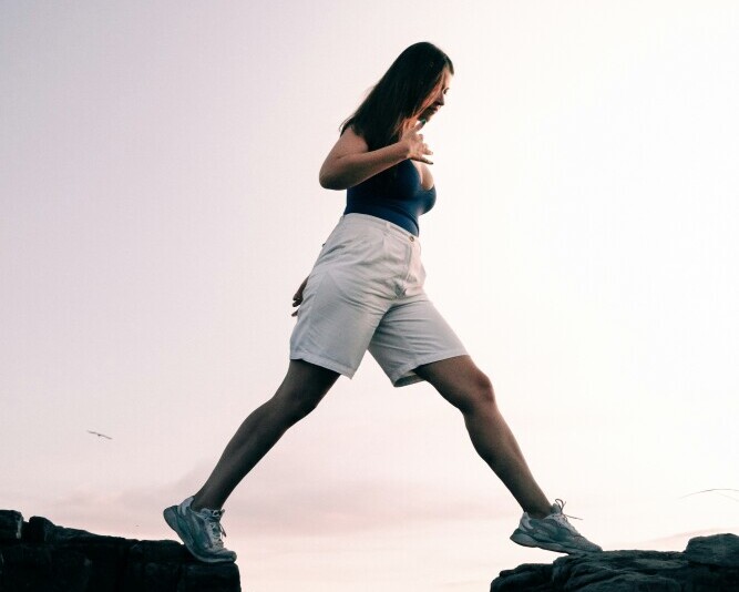 A person stopping and losing progress versus another continuing steadily, showing how consistency builds momentum