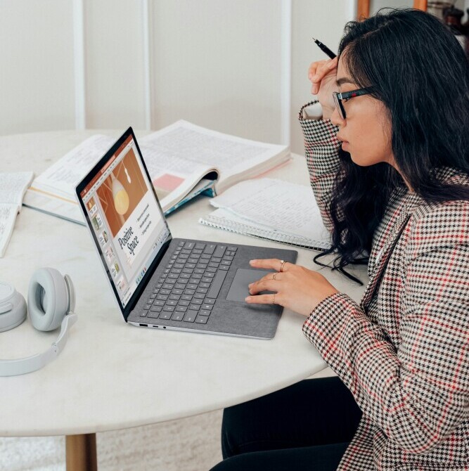 A content creator working in focused time blocks with a timer, staying productive and organized