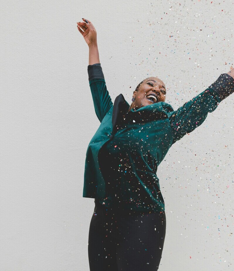 A woman celebrating her success