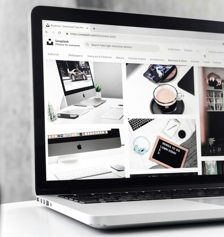 A clean and minimalist blog layout on a laptop screen, simple content structure, user-friendly design