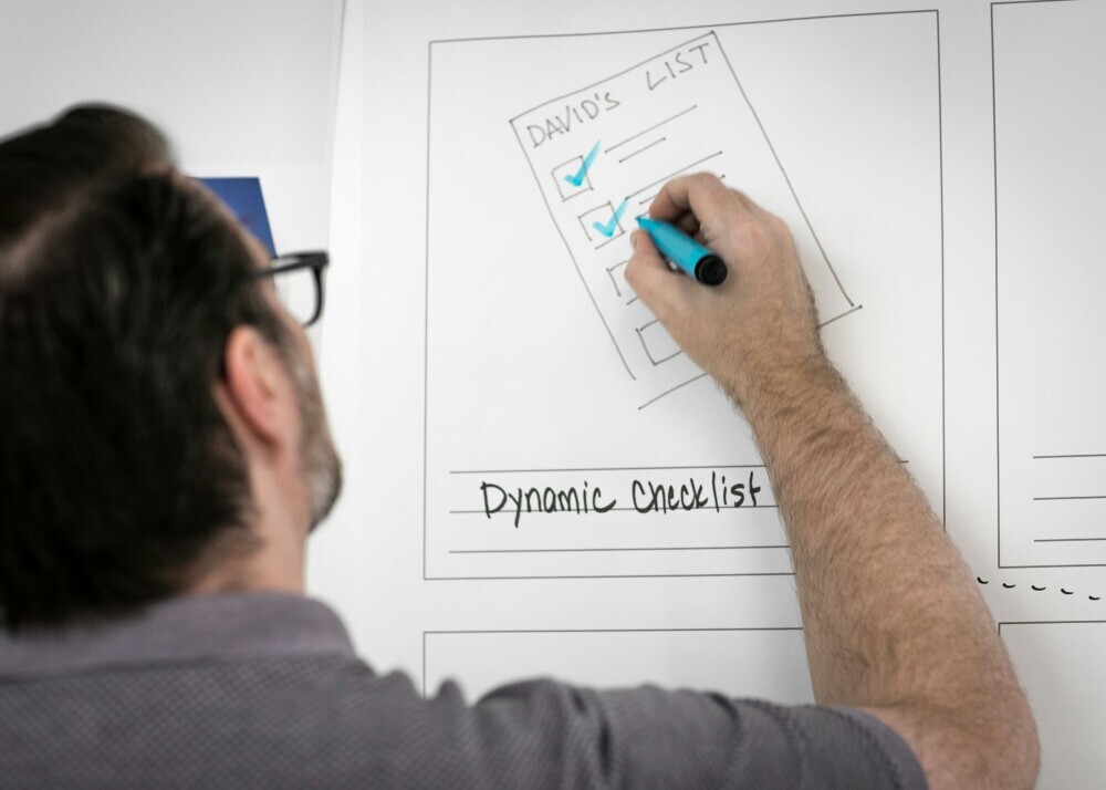 A content creator marking completed tasks on a checklist, showing steady and consistent progress over time