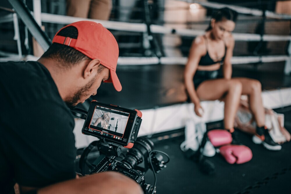 A content creator practicing consistently, gaining confidence and improving skills through repeated action