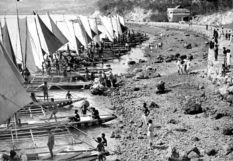 Canoes lined up outside the Port Moresby Aquatic Club House for the start of a race, from an article in Walkabout magazine, 1934, rather misleadingly called 