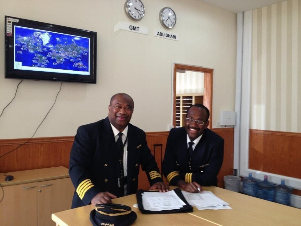 Captain Nigel and his dad Narara having the defriefing before their historical flight together