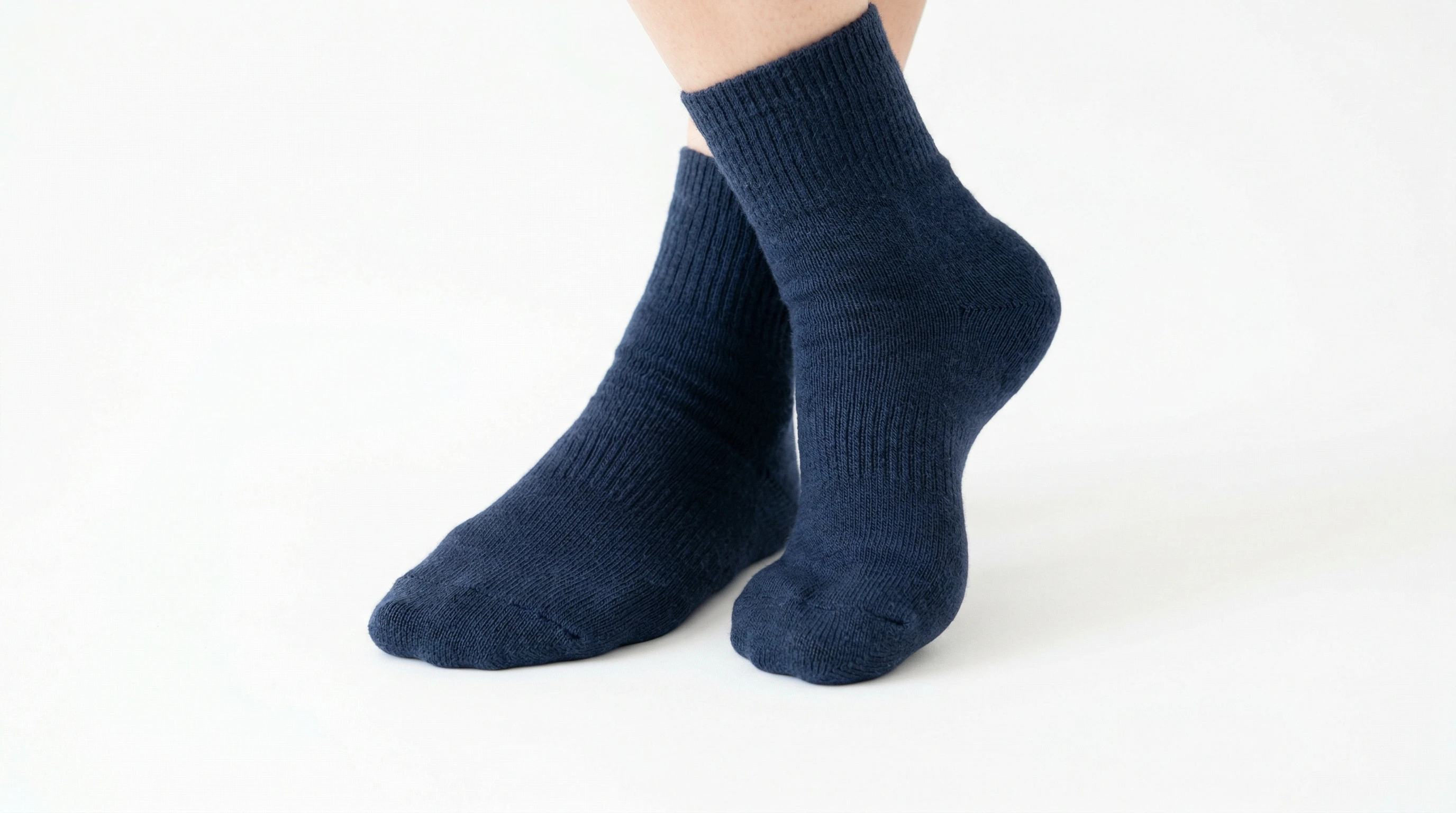 Stocking feet on bright white background