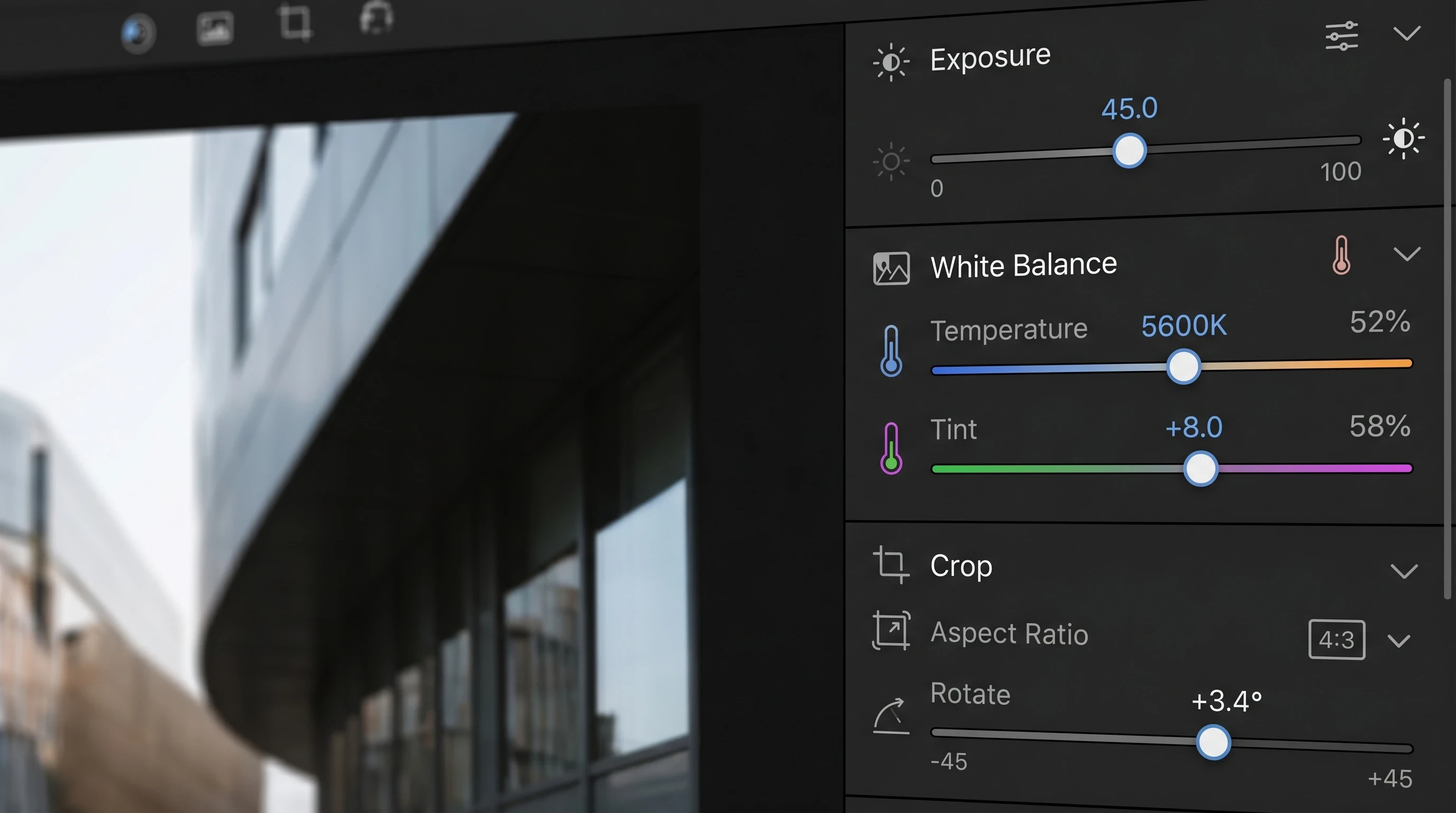 A screenshot of a photo editor interface, focusing on editing sliders for exposure, white balance, and cropping.