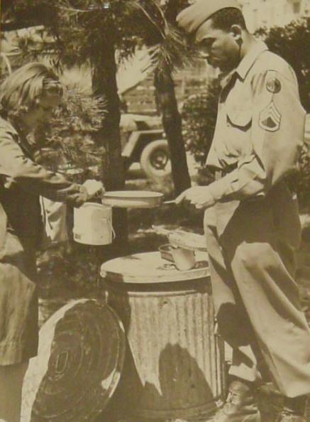 My Dad with the 92nd ID feeds a homeless Italian girl