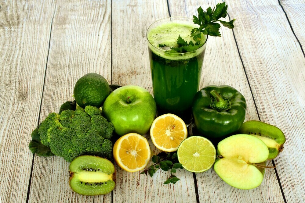 nutrition:  an array of green fruits and veggies 