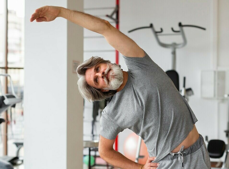 senior male doing stretching exercise