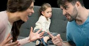 man uttering threat against wife with child present