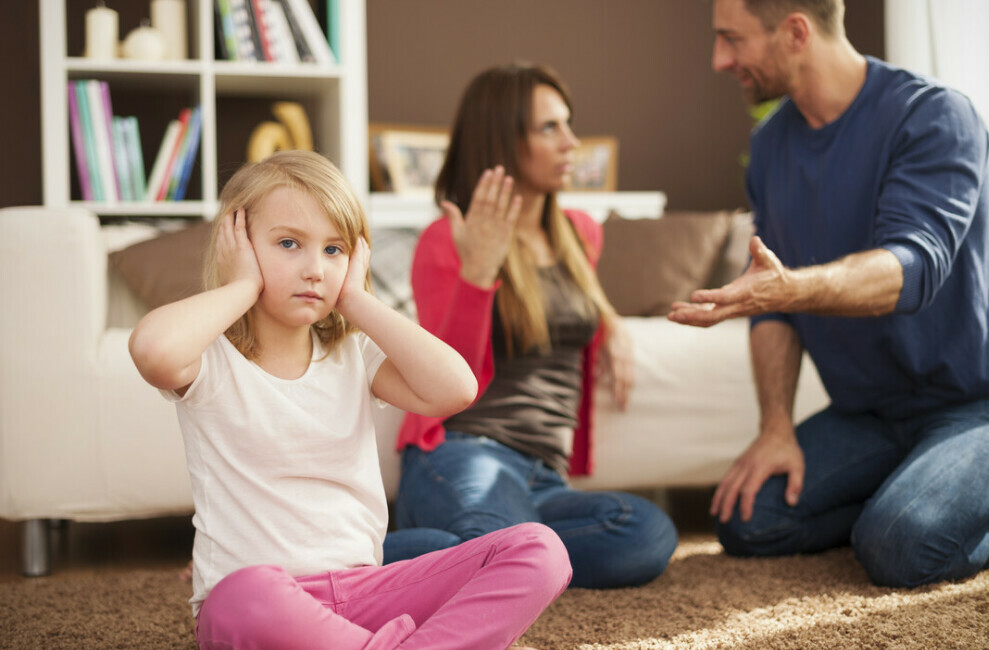 child sad that parents are arguing