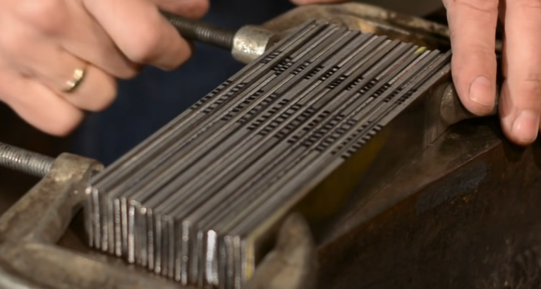 Layering Steel Bars Into Billet