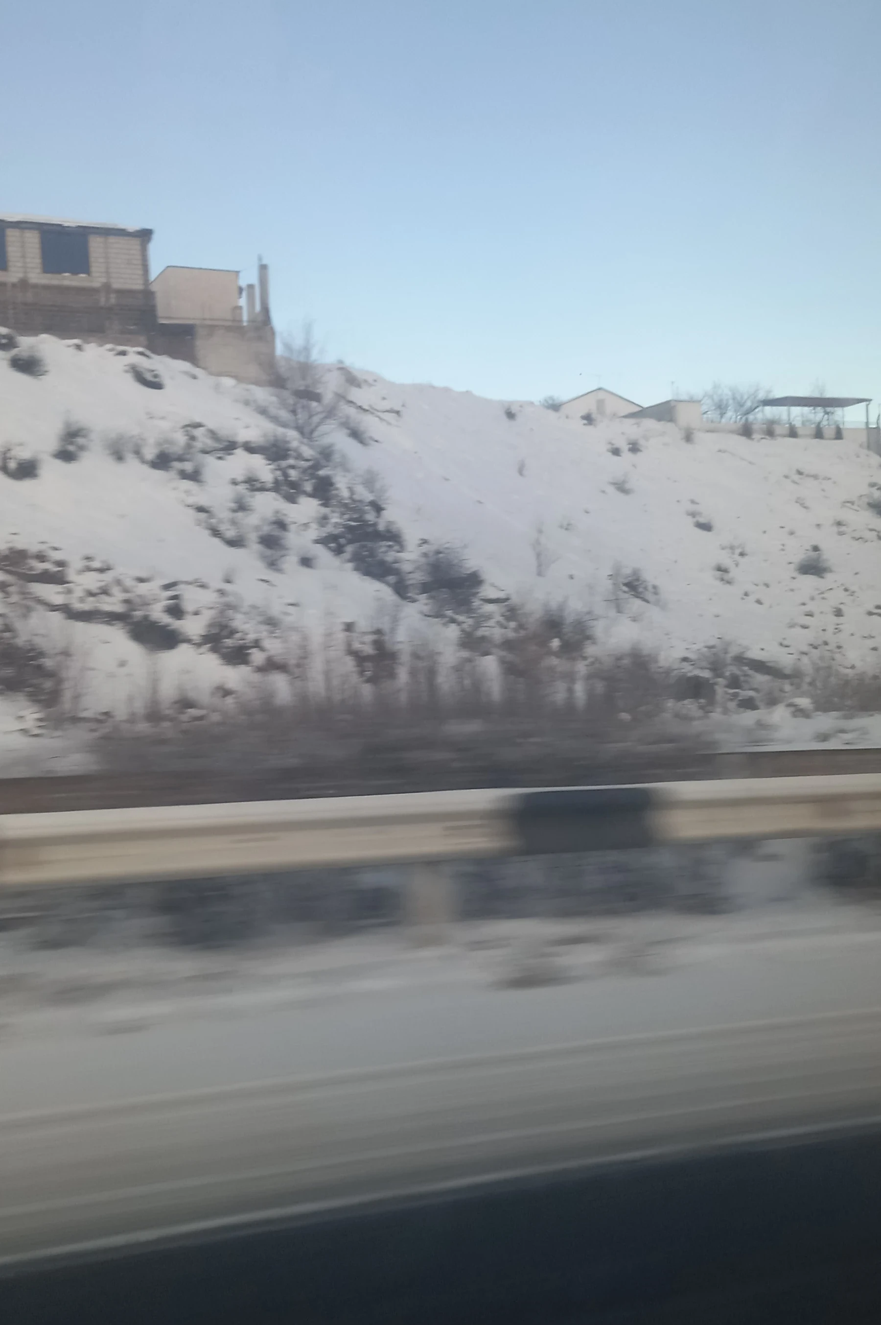 Road from Yerevan to Tbilisi on a snowy day in March