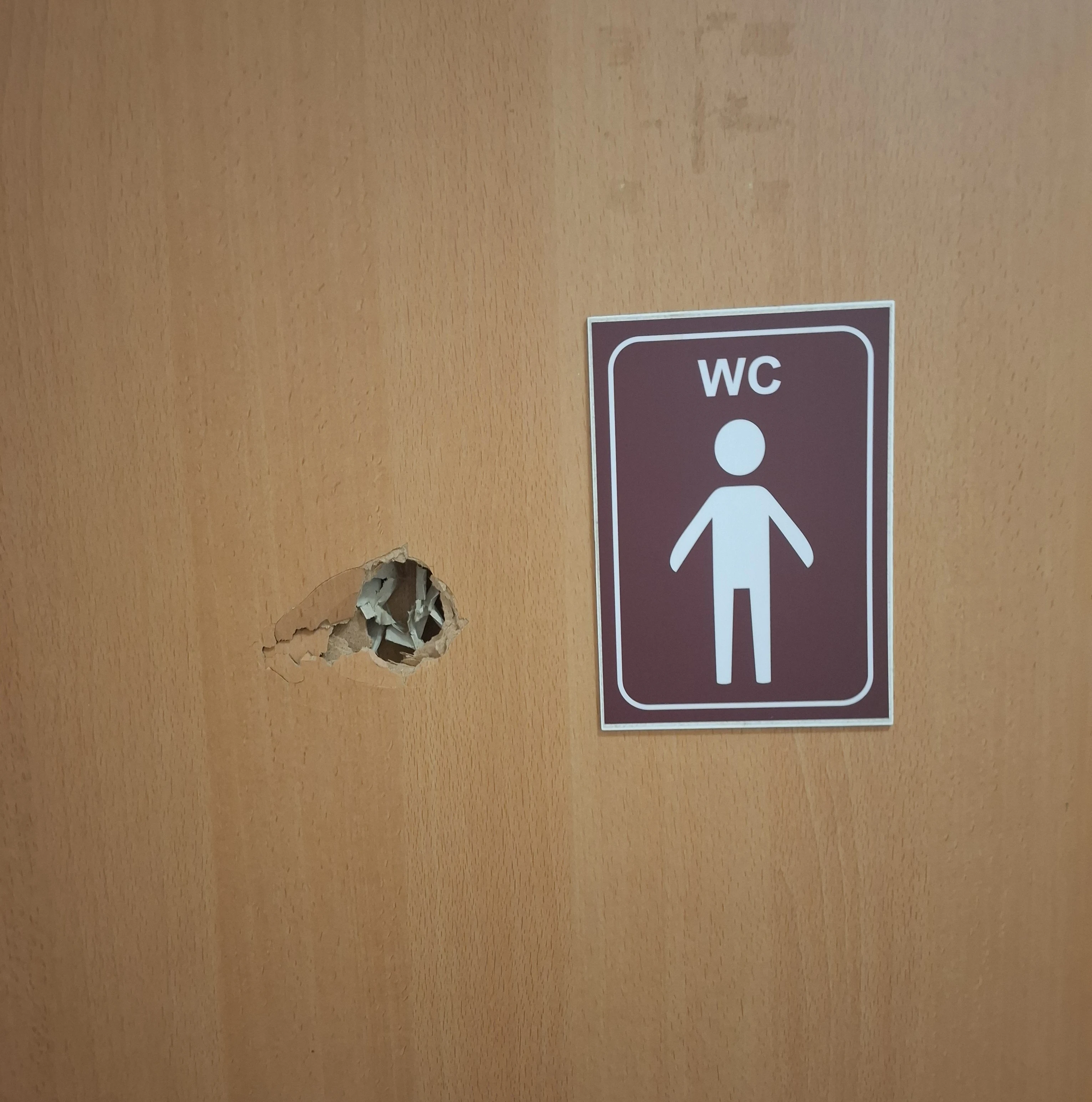 Hole from where someone punched the door at my hostel in Wroclaw Poland