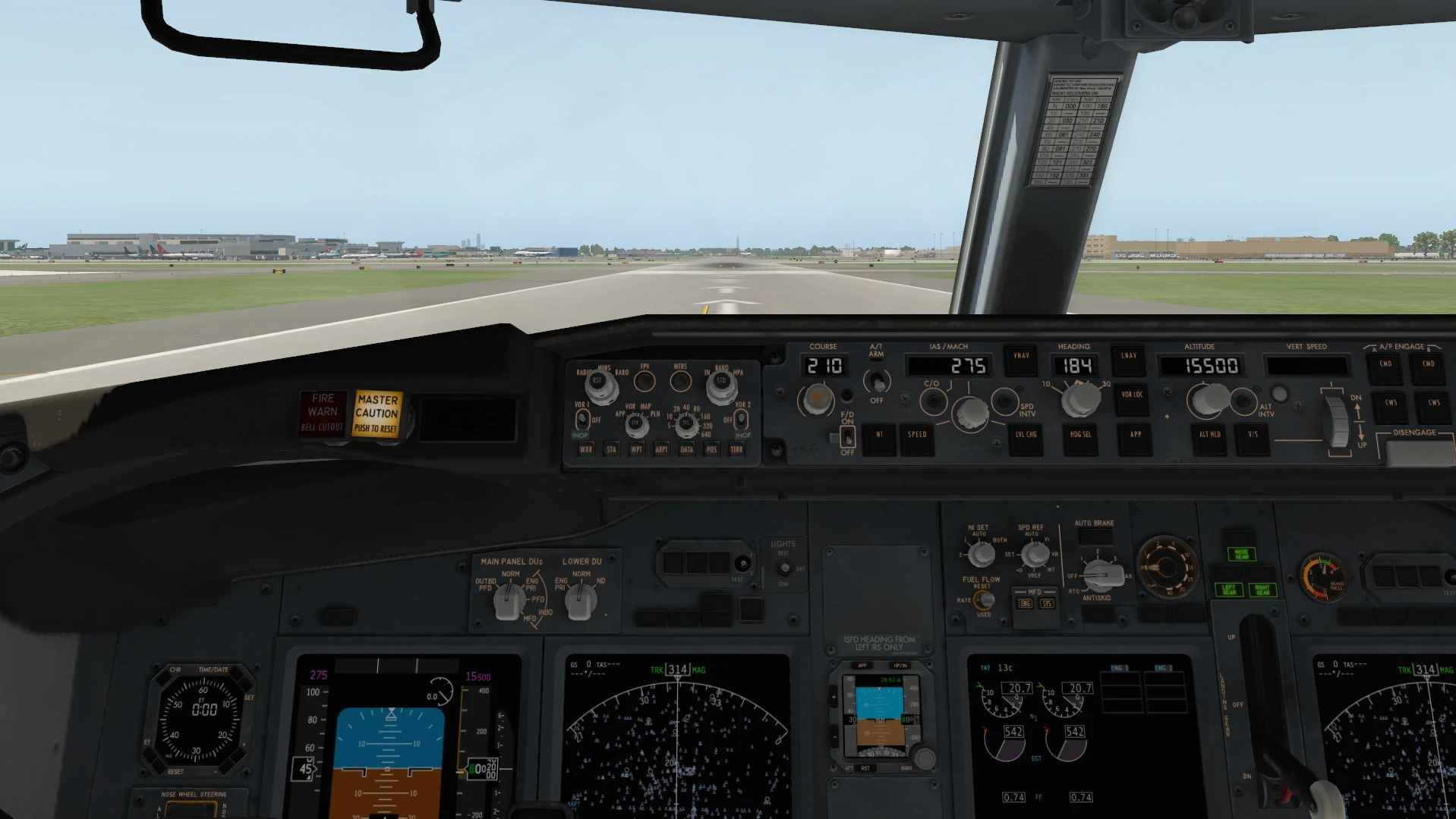 X-Plane 11 cockpit view aligned on runway before takeoff showing pre-flight setup and instrument panel.