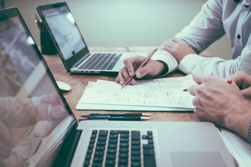 people working on financial documents