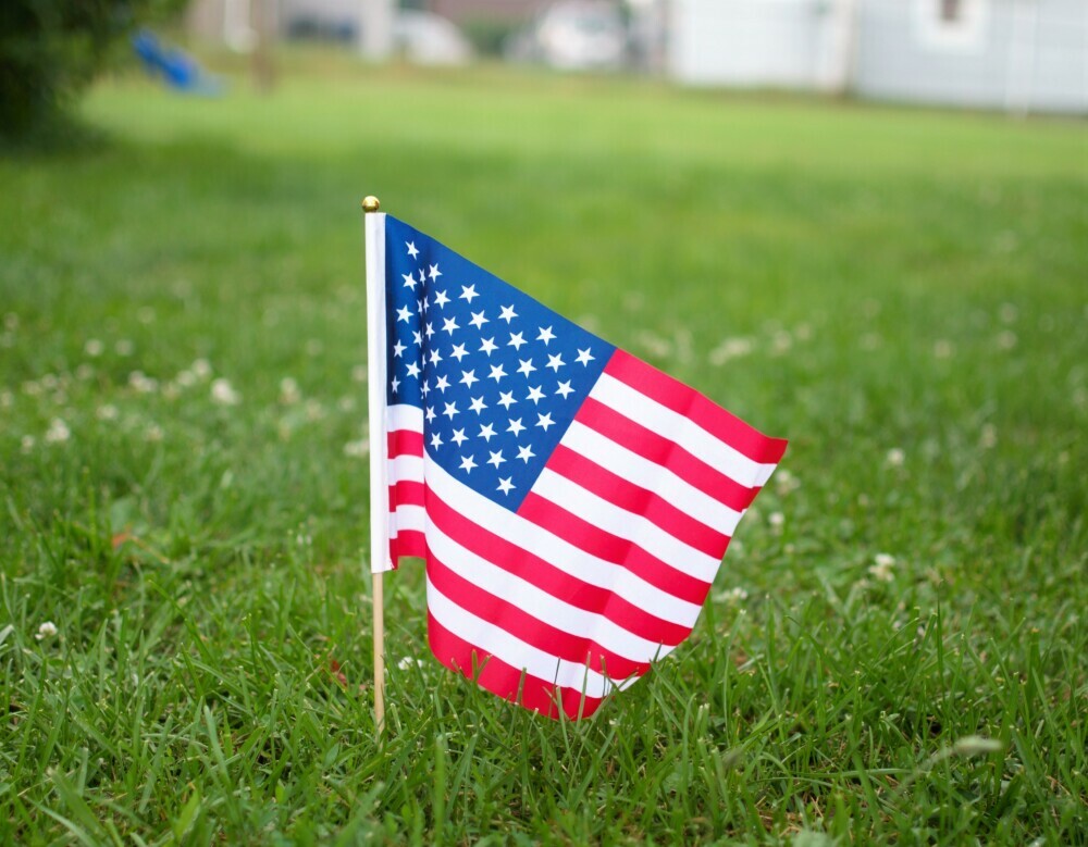 Amerian flag on a lawn