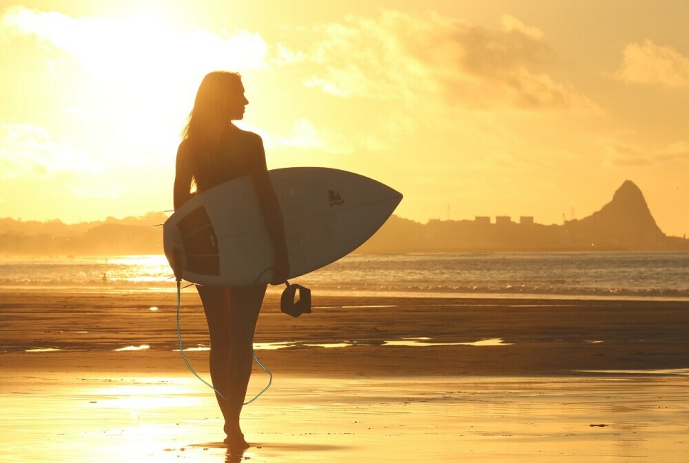 woman with surfboard