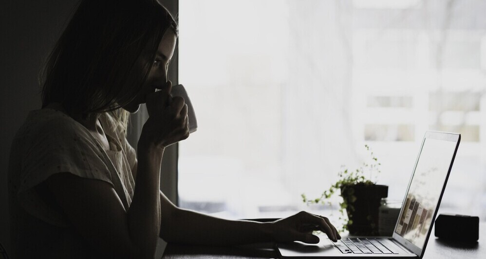 woman with laptop and coffee