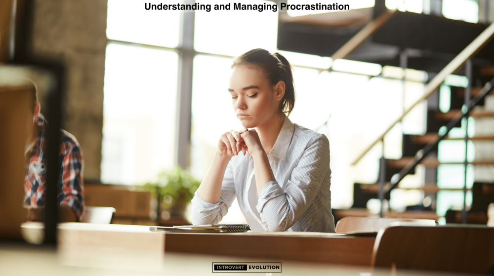 Understanding and Managing Procrastination - Woman siting at the desk