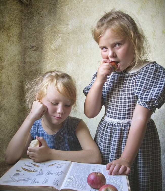 Two girls learning