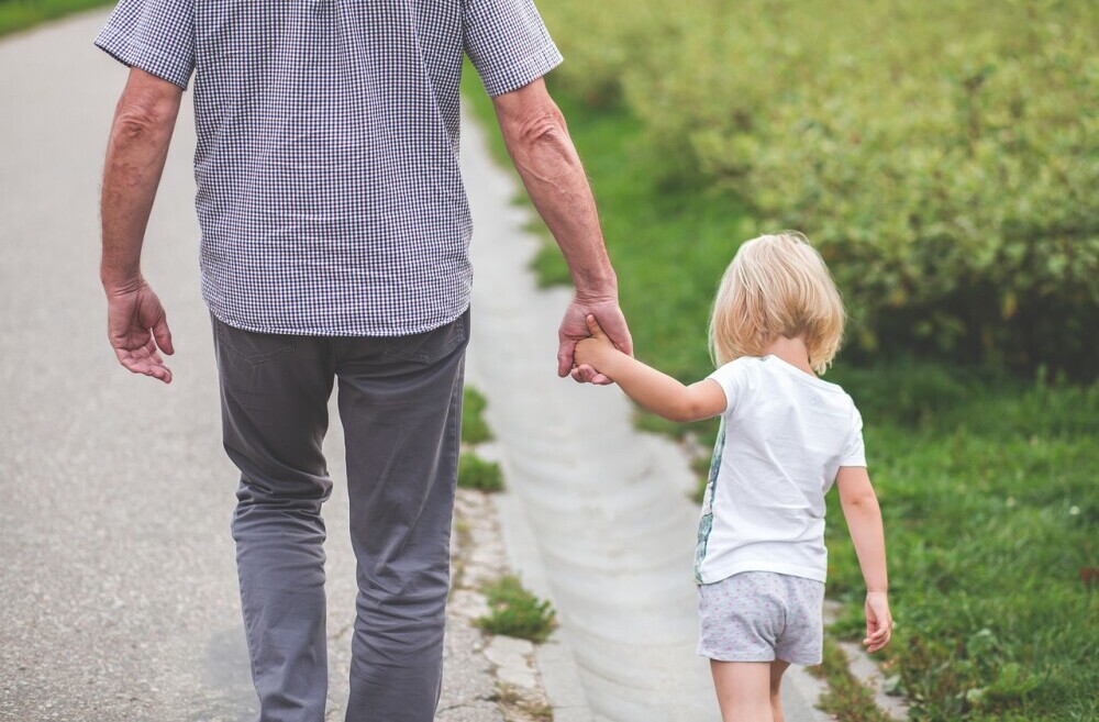 Dad and daughter walking