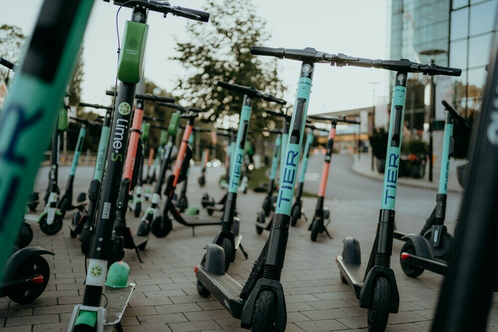 A collection of electric scooters for hire in the city