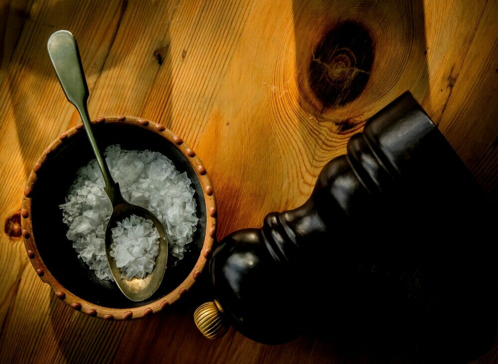 Image of a bowl with salt on a table