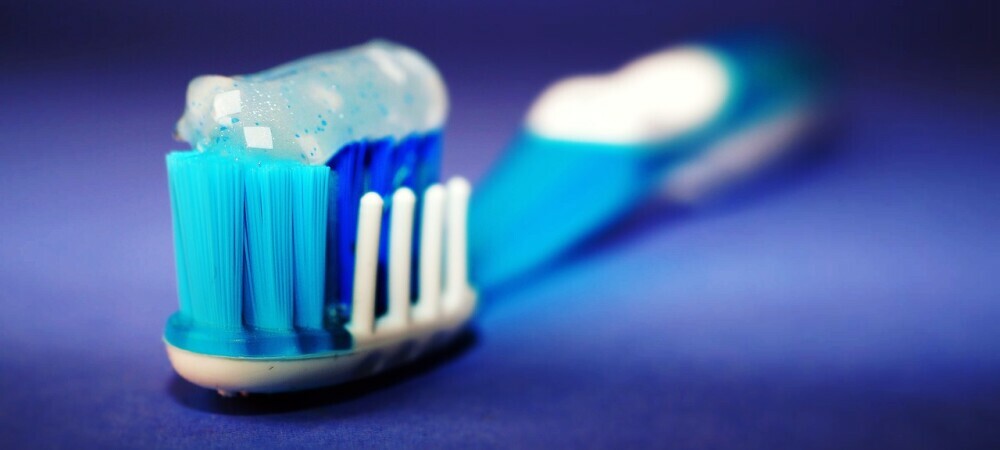 Image of toothpaste on a toothbrush