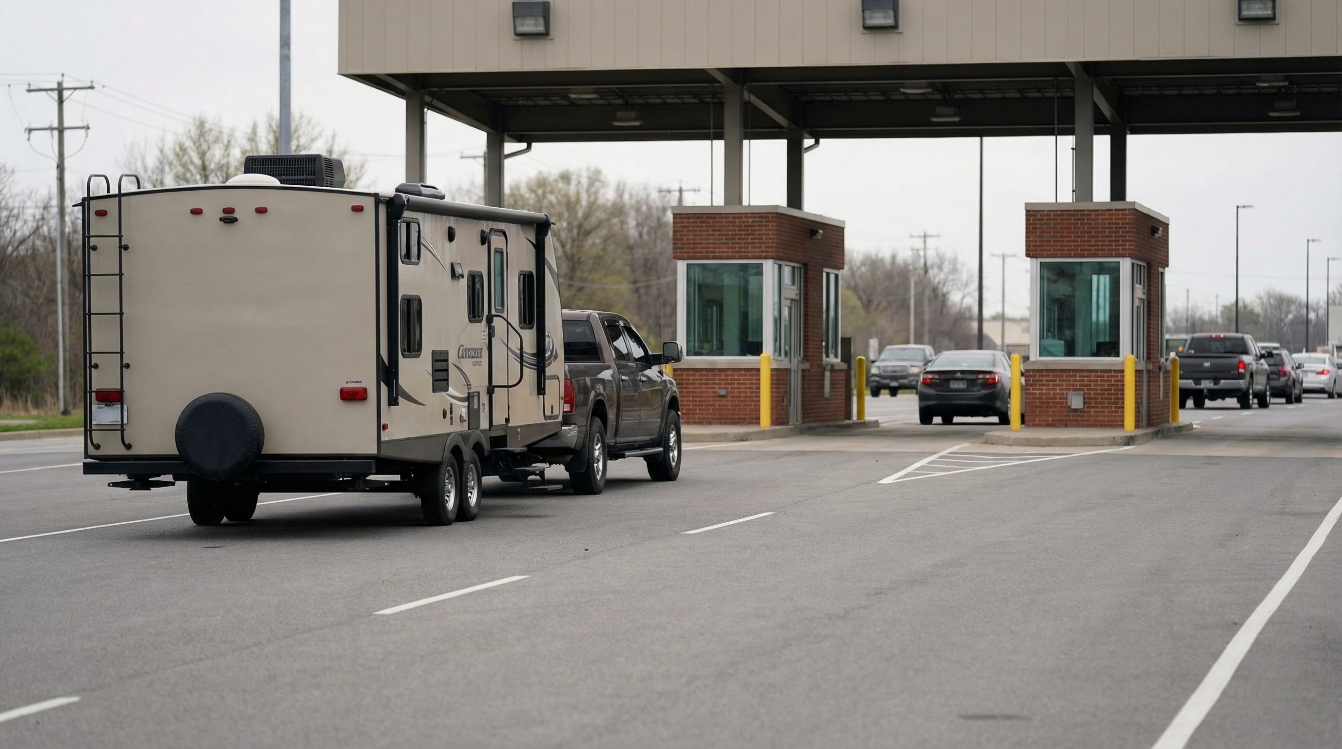 RV and travel trailer at a US–Canada land border crossing