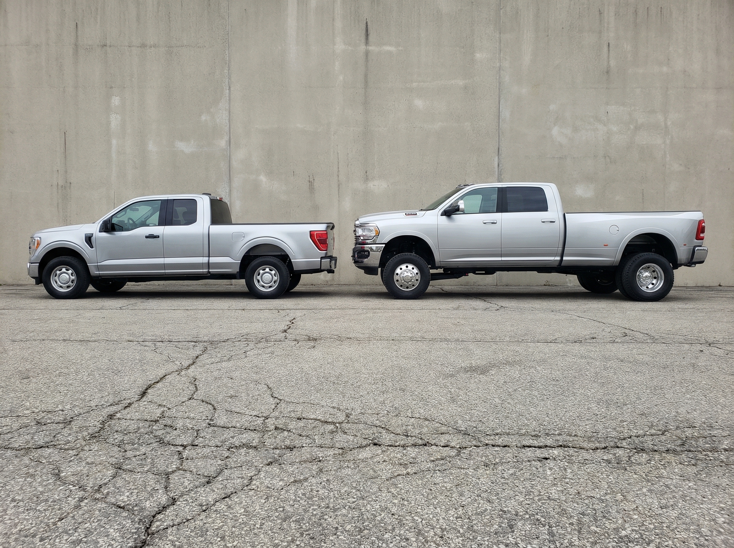 Side-by-side comparison of half-ton pickup and heavy-duty dually truck stance