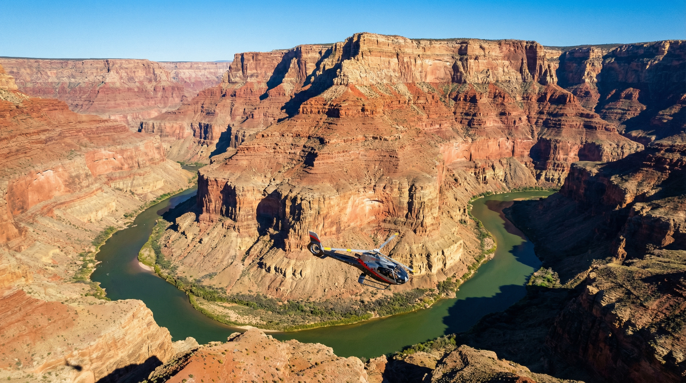Helicopter flying over Grand Canyon landscape
