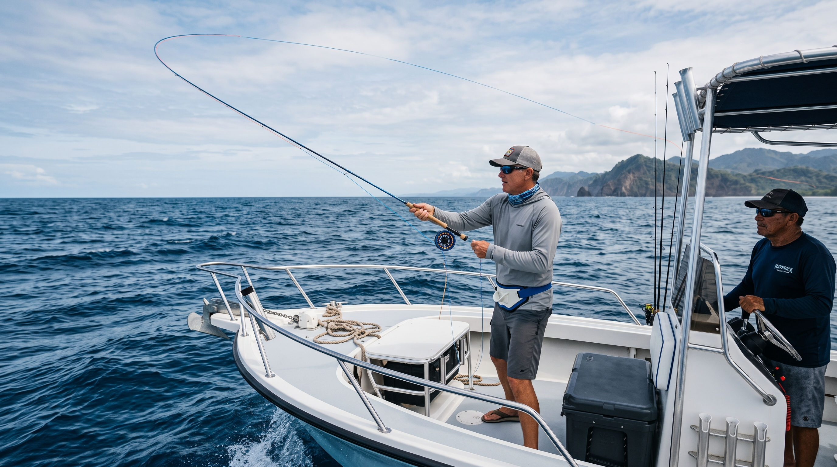 Saltwater fly angler casting from the bow of a boat off Costa Rica's Pacific coast