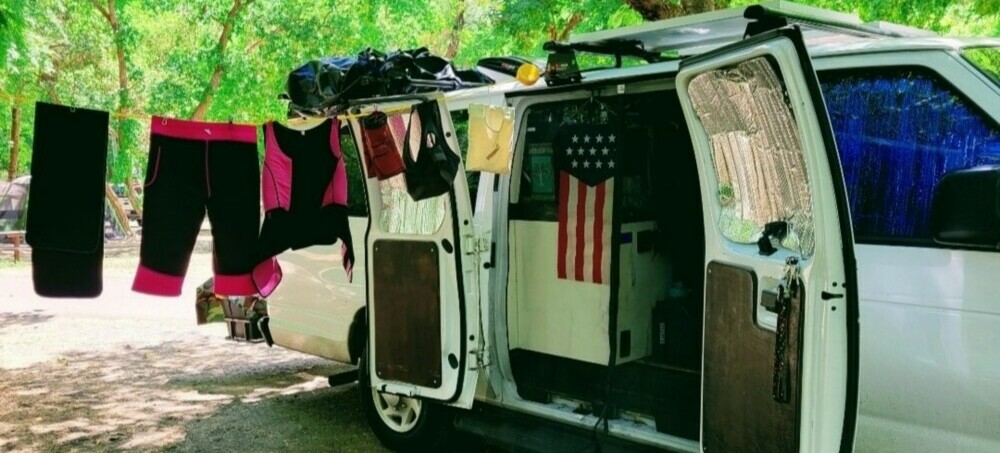 Getting Camp set up for drying the clothes. How is that clothesline tied?