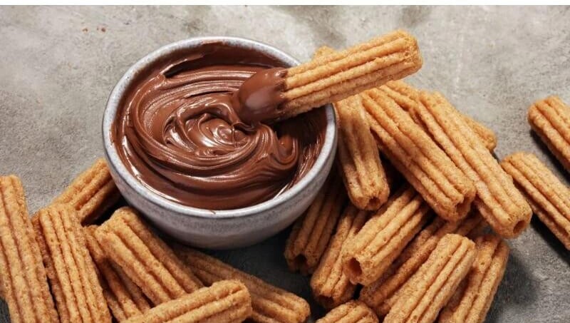 Churro with chocolate a food dreamer's delight!